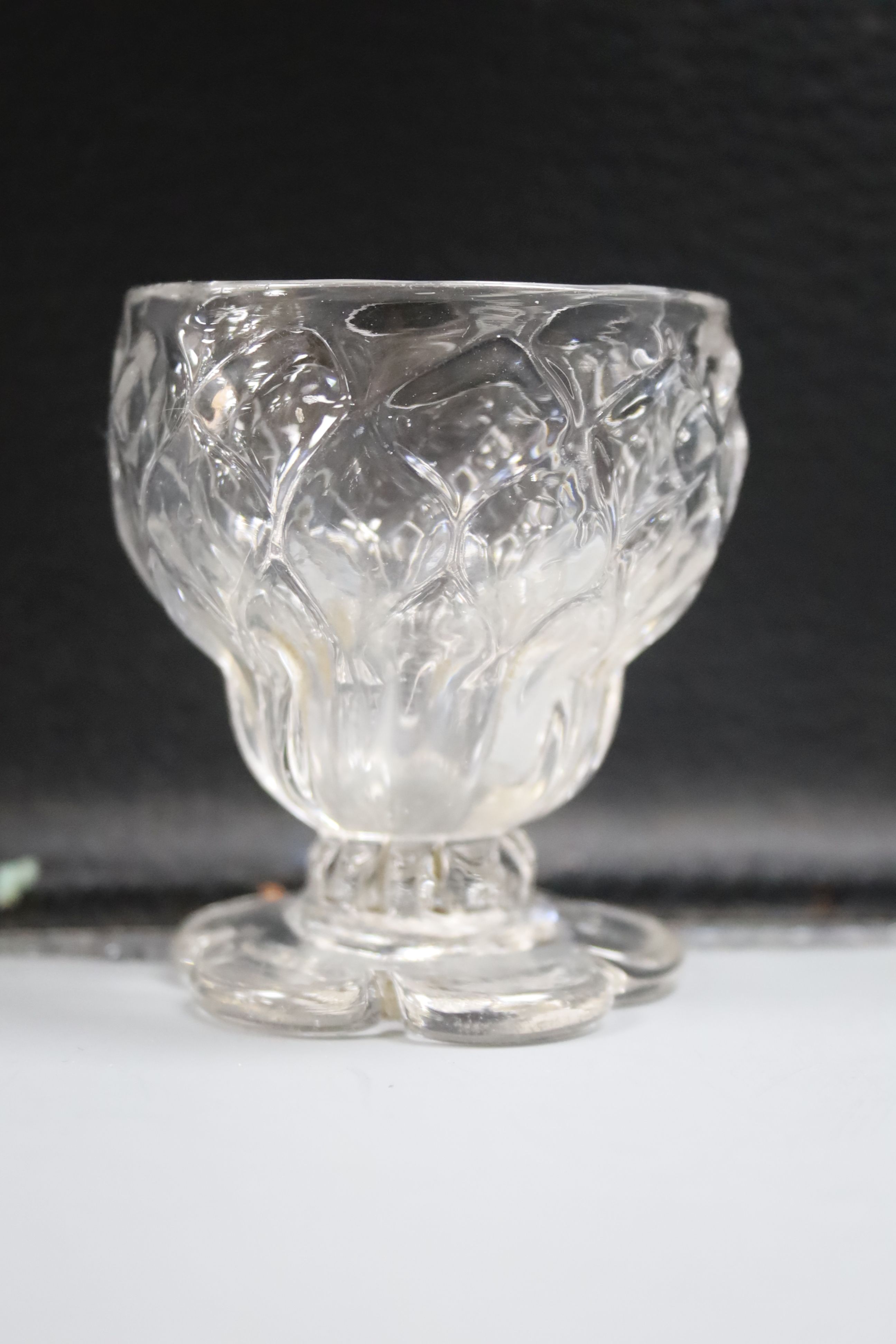 Four 18th century sweetmeat glasses, two with applied blue cable, a George III rummer and an 1842 commemorative goblet